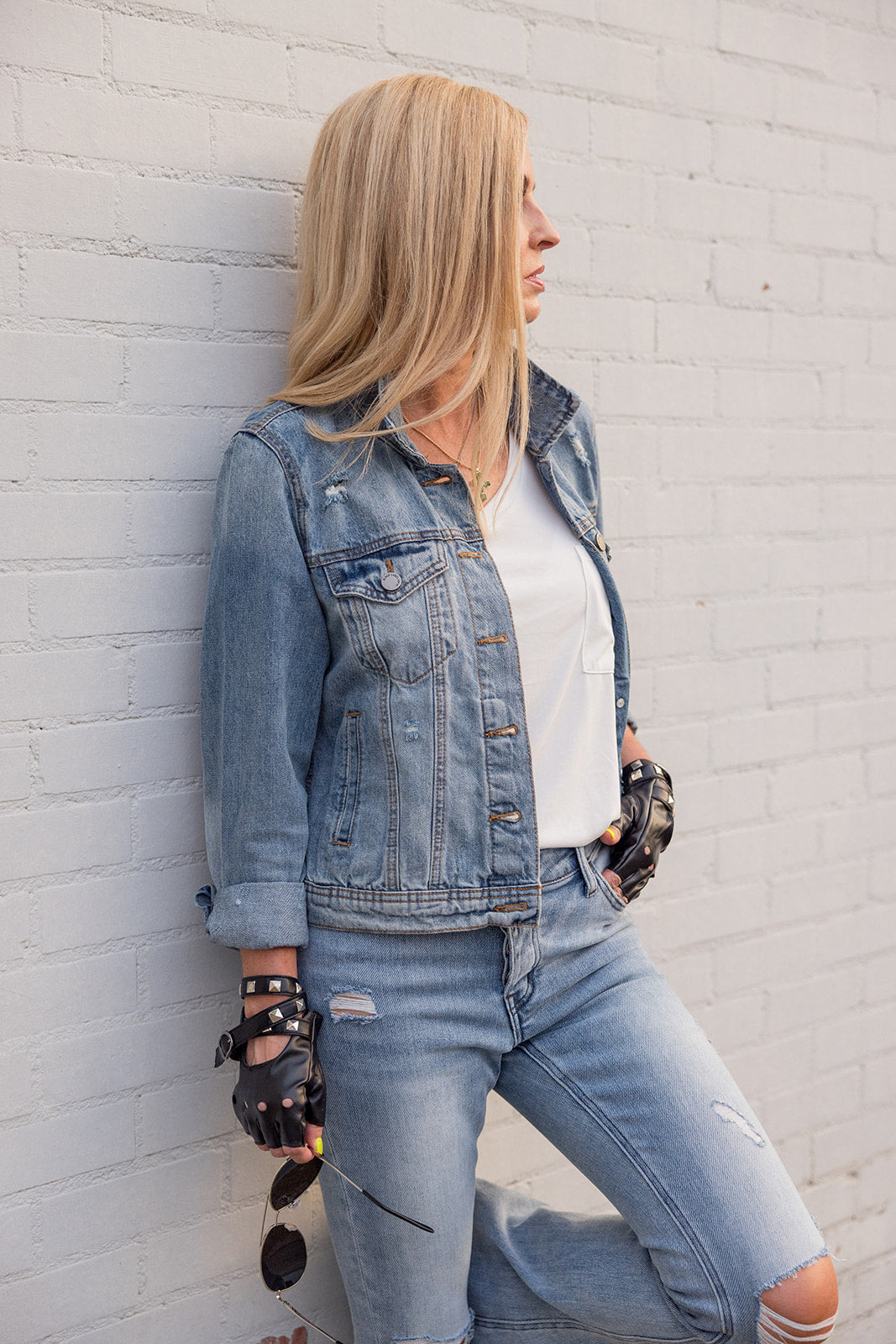 Distressed denim trucker jacket