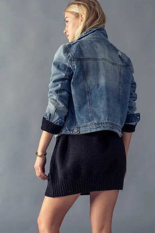 Distressed denim trucker jacket